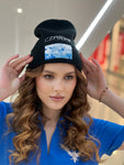 Czarina Sasha (@sashastarynets) is wearing a Black Beanie with blue sky design and white embroidered CZARINA from Czar Clothing